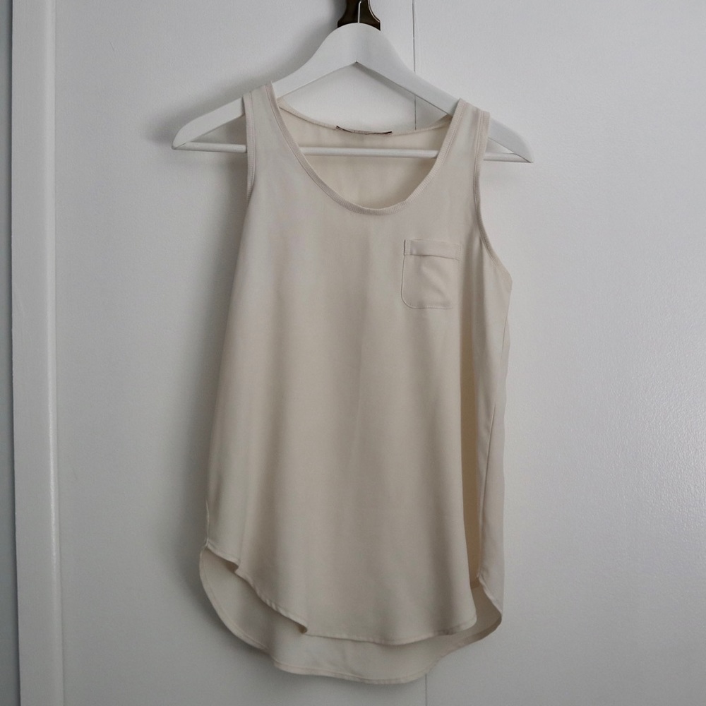 LOFT cream sleeveless blouse